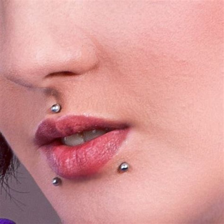 Can I change my lip piercing after 2 weeks?