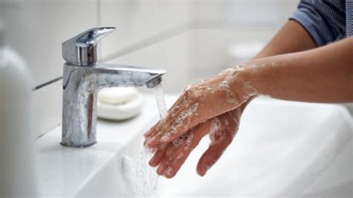 Do guys have to wash their hands after peeing?