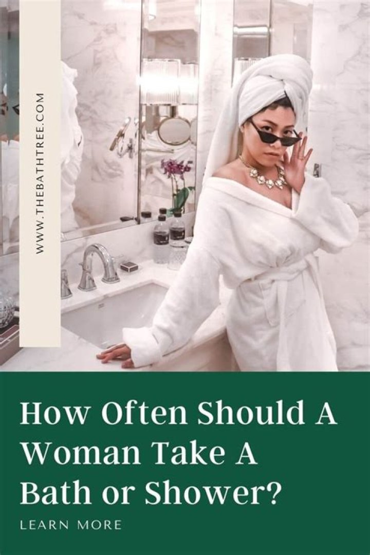 How often should a woman take a bath?