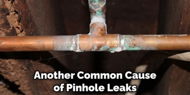 What causes pinholes in copper water pipes?