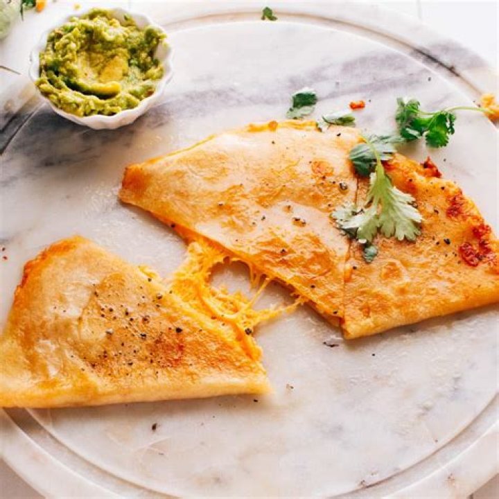 What kind of white cheese do Mexican restaurants use on tacos?