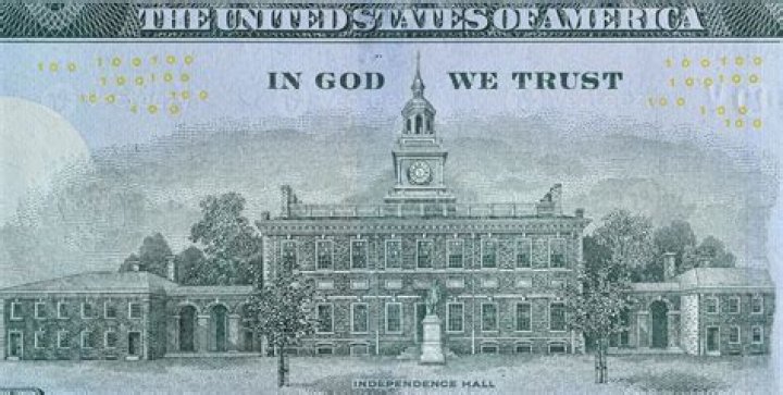 Which president established in God we trust as our nation's motto?